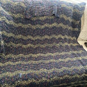 Multicolor handmade knitted blanket with hood. Wrap yourself completely in this.